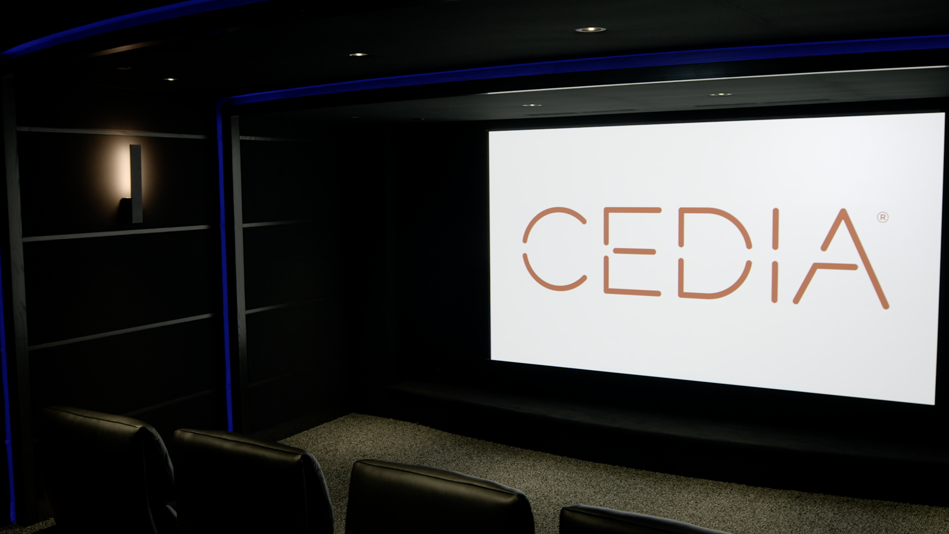 CEDIA on screen looking from right to left side of theater